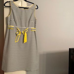 Grey and white striped dress with yellow accents